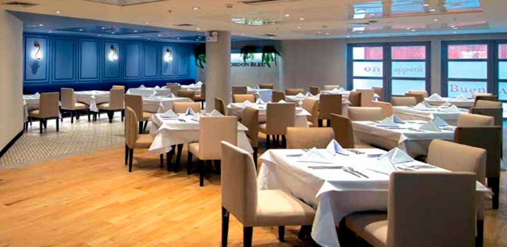 Qhusi Taller restaurante by Le Cordon Bleu - Arqlab